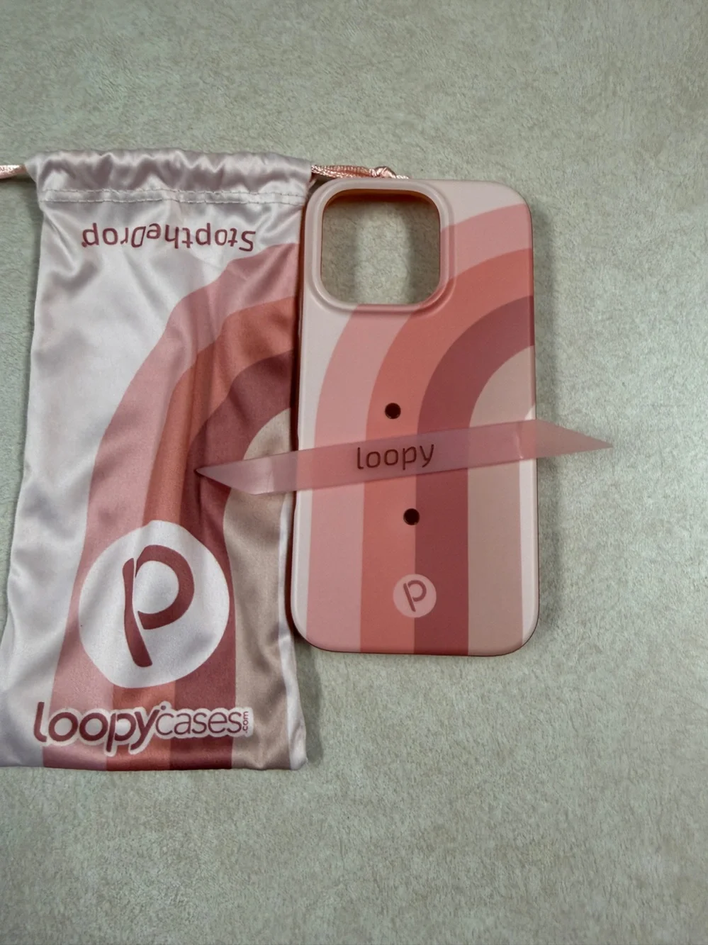 Loopy Case 16 pro righty Terracotta Dreams Phone Case with Loopy strap and bag